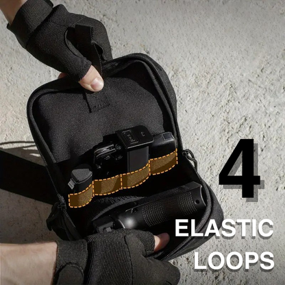 Black pouch with elastic loops held by a gloved hand against a concrete wall.